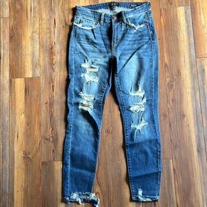 Distressed Blue Denim Jeans